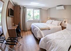Viena Flats - Gramado - Schlafzimmer