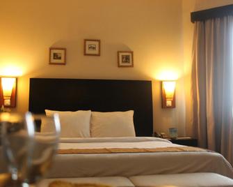 Imara Hotel Palembang - Palembang - Bedroom