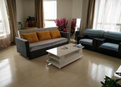 Dalian Xiuzhu Mansion Apartment - Dalian - Living room