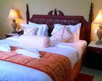 Madathil Regency Hotel - Kollam - Ložnice