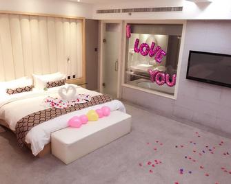 Cygnus International Hotel - Luoyang - Schlafzimmer