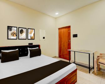 Hotel O Friends Stay - Chandrapur - Bedroom