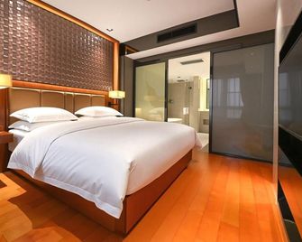 Hengyang Yancheng Hotel (Nanhua University Affiliated Branch) - Hengyang - Schlafzimmer