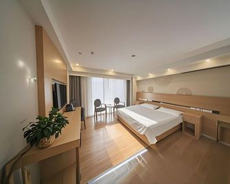 Greentree Inn Xining Jianguo Road Railway Station Express Hotel - Xining - Schlafzimmer