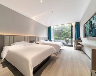 Mingkang Fashion Hotel - Chengdu - Bedroom