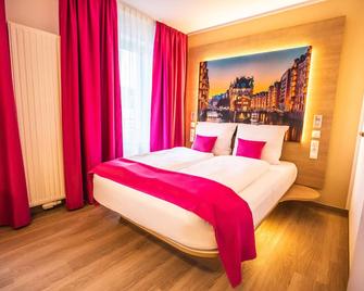 Hotel Luckys Inn - Hamburg - Schlafzimmer