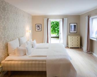 Suite mit Bergblick - Bio Design Boutique Hotel Landhaus St. Georg - 巴特維塞 - 臥室