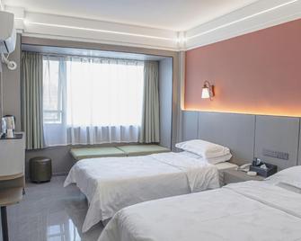 Haiyi Hotel - Hanzhong - Bedroom
