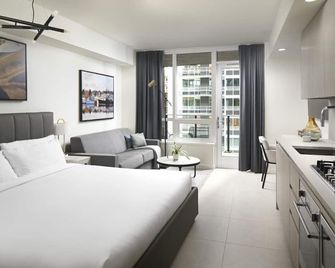 Level Seattle- Studio Suite w/ full kitchen, in-room laundry & resort amenities - Seattle - Habitación