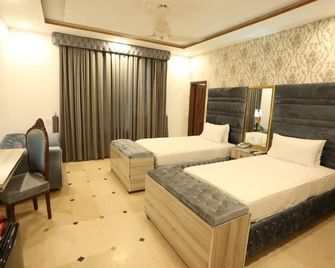 Hotel Grand Swiss - Lahore - Slaapkamer