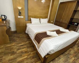 Vang Vieng Golden Lotus Hotel - Vang Vieng - Bedroom