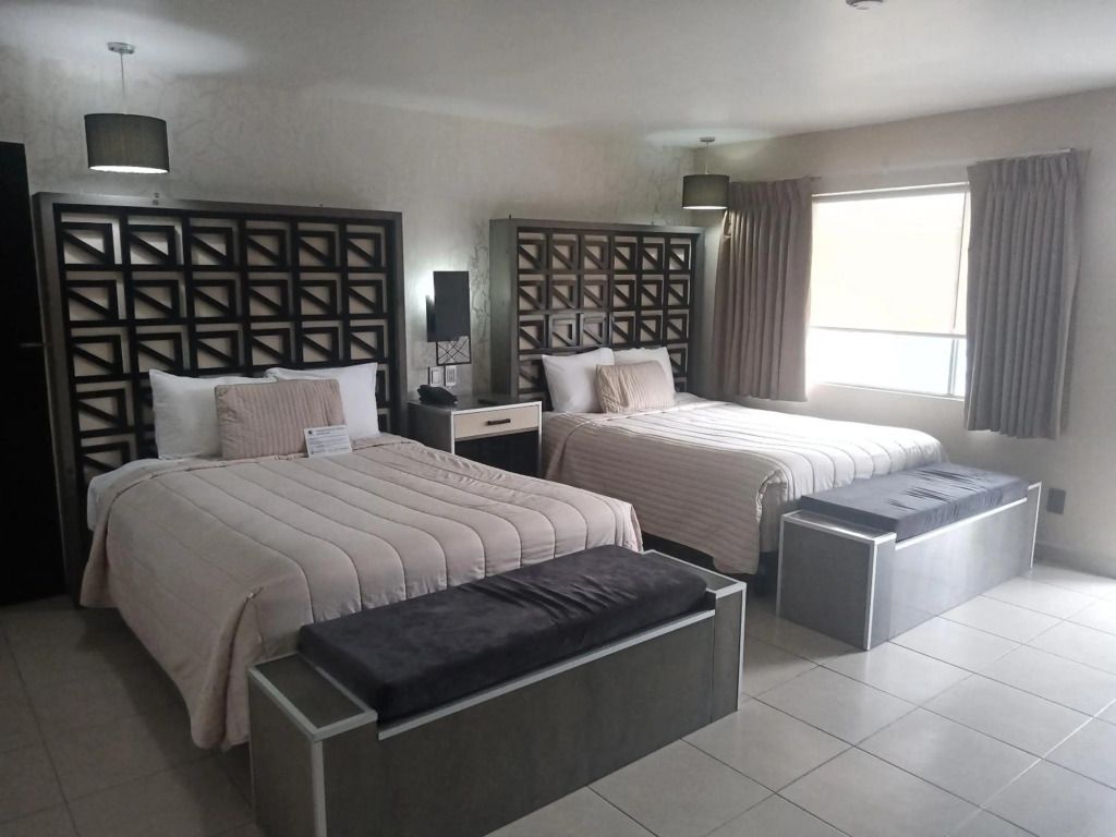 باجا إن هوتليس لا ميسا - تيجوانا - غرفة نوم