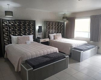 باجا إن هوتليس لا ميسا - تيجوانا - غرفة نوم