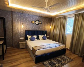 Kanha Meadows Resort - Kanha - Habitación