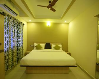 Kans One - Chennai - Schlafzimmer