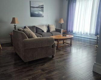Cozy 2 bedroom fully furnished apartment in centre of Stephenville, Newfoundland - Stephenville - Living room
