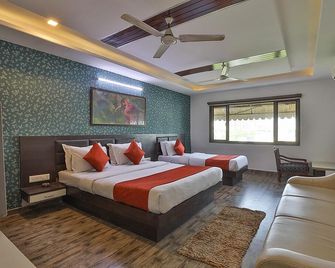 هوتل سادبهاف - أحمد أباد - غرفة نوم