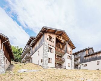 Appartement spa fleures d'Orelle - Orelle - Edifício