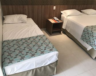 Original Trips - Hotel Turismo - Rio Quente - Ložnice