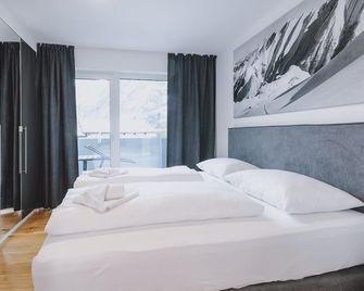 FP Appartements by we rent - Kaprun - Sypialnia