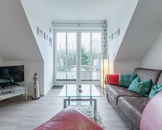 Haus Passat - Ferienwohnungen - Nienhagen - Вітальня