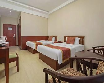 Honggang Hotel - Dalian - Bedroom