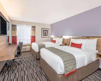 Microtel Inn & Suites by Wyndham Sudbury - Sudbury - Bedroom