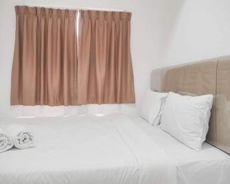 Good Place 1Br Menara Kebon Jeruk Apartment - Giacarta - Camera da letto