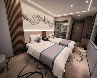 Xiangxing Hotel - Zhongshan - Slaapkamer