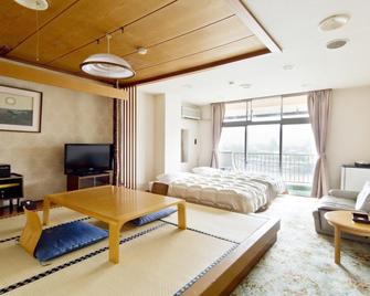 Kameyama Onsen Hotel - Kimitsu - Slaapkamer