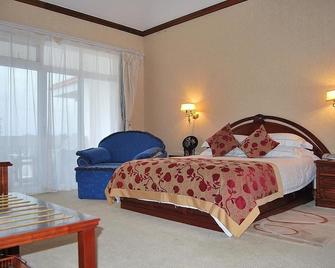 Dianchi Garden Resort Hotel - Kunming - Schlafzimmer