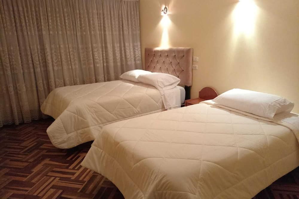 هوستال سويت أندينا - بونو - غرفة نوم