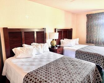 Haven Inn & Suites - Monroe - Bedroom