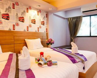 Airbest Gemtree Lampang Hotel - Лампанг - Спальня