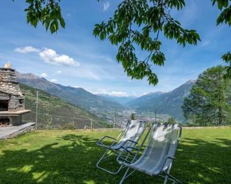 Conclonaz by Interhome - Sarre - Patio