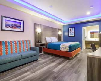 Scottish Inn & Suites Houston Willowbrook - Jersey Village - Bedroom