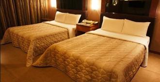 Beverly Garden Motel - Chiayi - Schlafzimmer