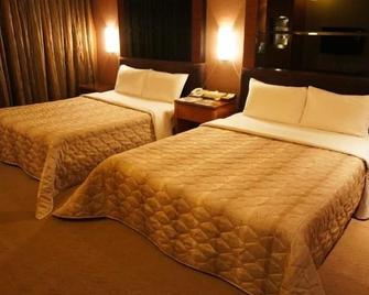 Beverly Garden Motel - Chiayi City - Bedroom