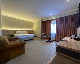 Grand Verona Hotel Samarinda - Samarinda - Schlafzimmer