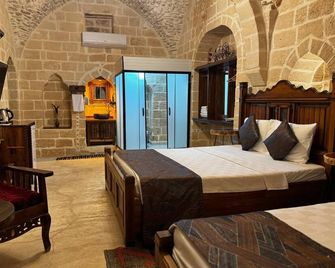 Aga Konagi Hotel - Mardin - Schlafzimmer