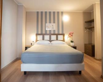 Gg8 Hotel & Suite Spa - Gualdo Tadino - Camera da letto