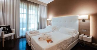 Raffaello Hotel - סניגאליה - חדר שינה