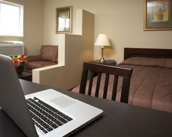 Travel Inn & Suites Innisfail - Innisfail - Schlafzimmer