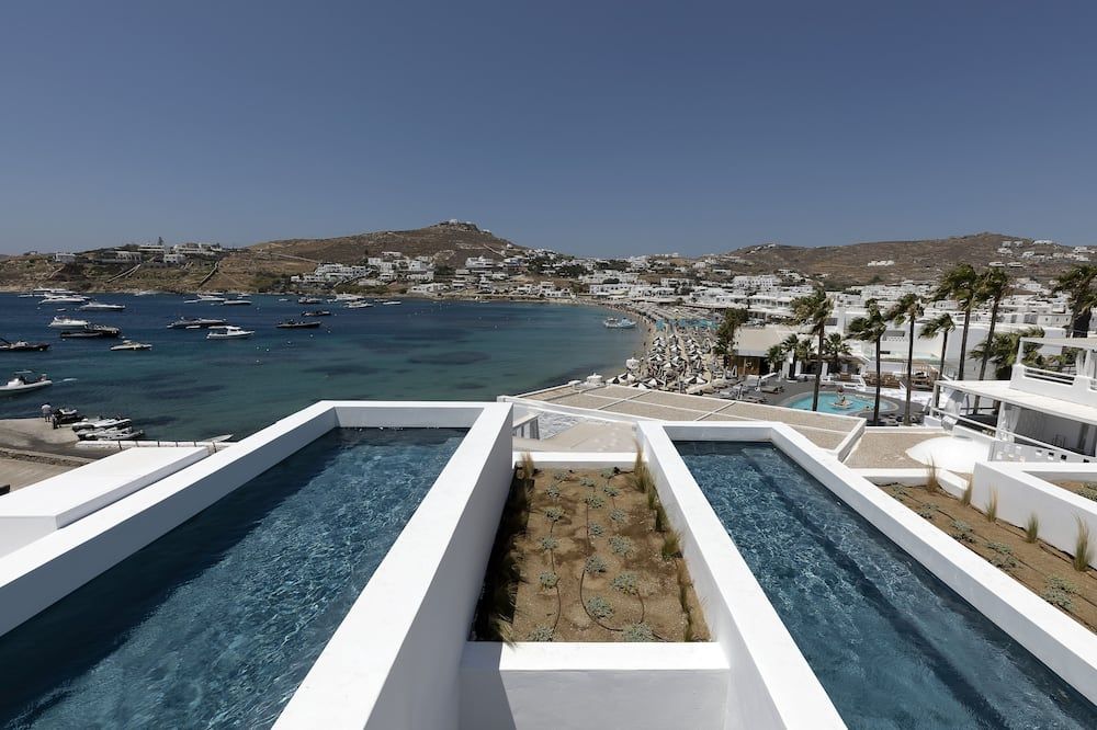 Cubic Mykonos Seafront Design Suites - Ornos - Zwembad