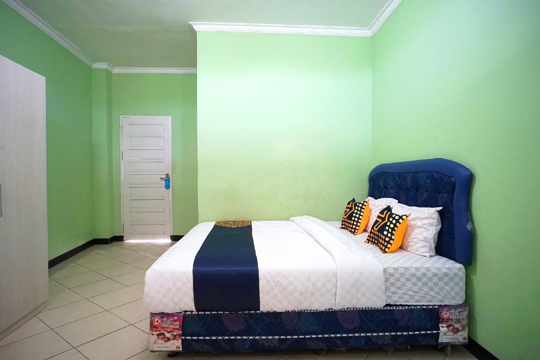 Spot On 2729 Marzan Syariah Guest House - באליקפאפן - חדר שינה
