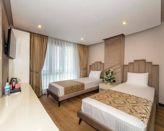 Hilltown Airport Hotel - Karaburun - Habitación