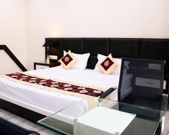 Hotel Neelam Moga - Moga - Camera da letto