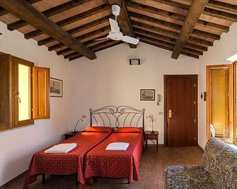 Helvetia Pisa Tower - بيسا - غرفة نوم