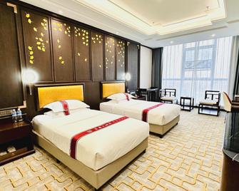 Juguo Hotel - Rizhao - Ložnice