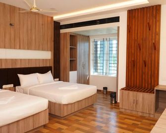 Hotel Anithaparthiban - Thanjāvūr - Спальня